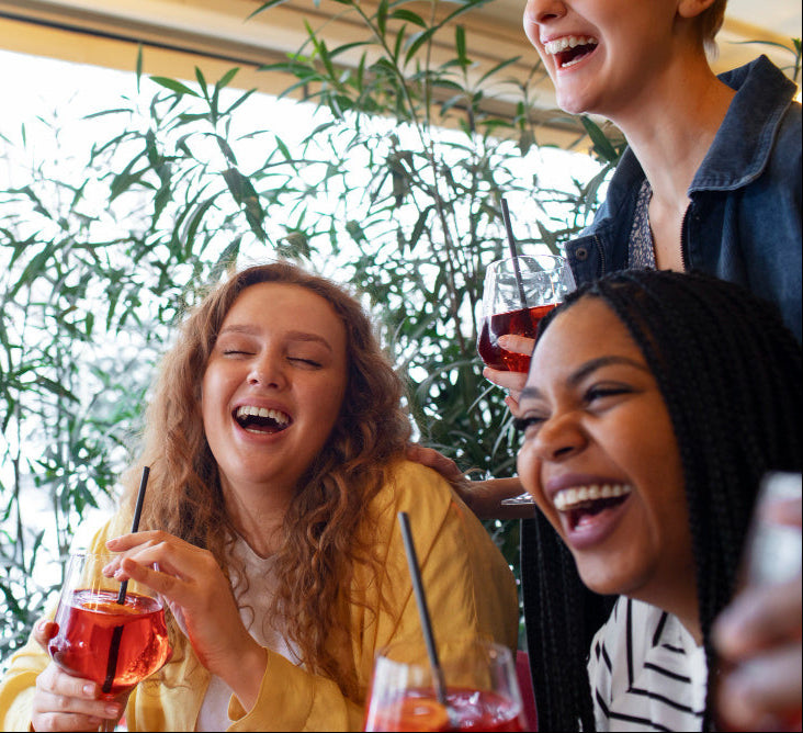 TSC Ladies laughing during drinks social